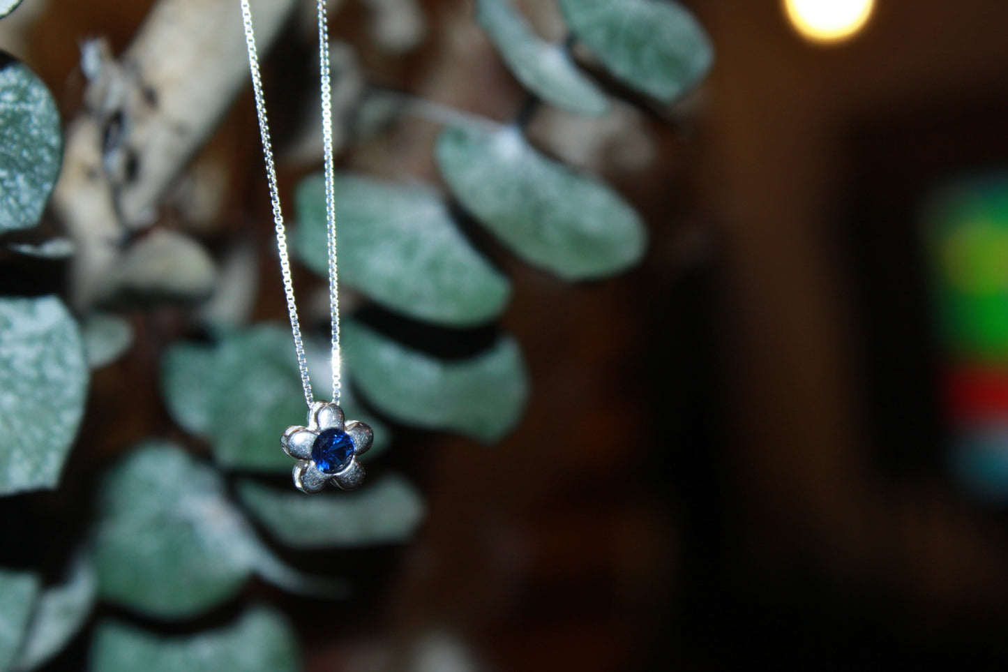 Collar Flor punto de luz